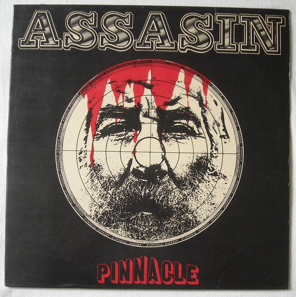 Vinyl record cover: black background, red and white target with a face.