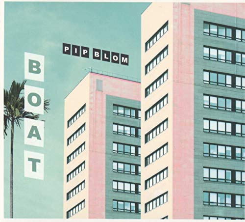 Album cover for Pip Blom’s “Boat” featuring pink and teal buildings.
