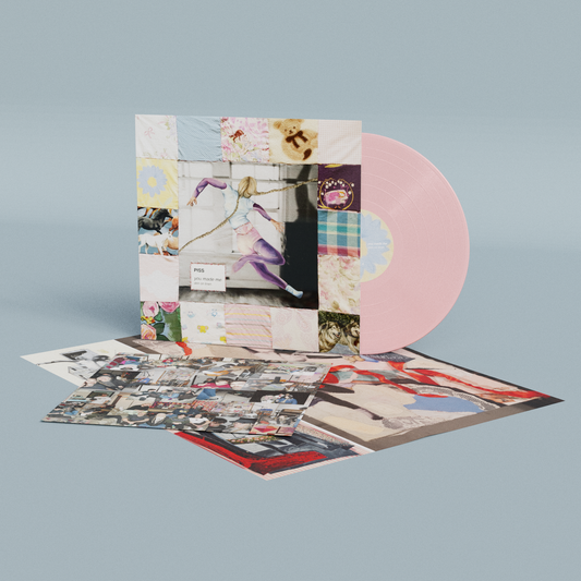 Pink vinyl LP with collage-style album cover and accompanying inserts.
