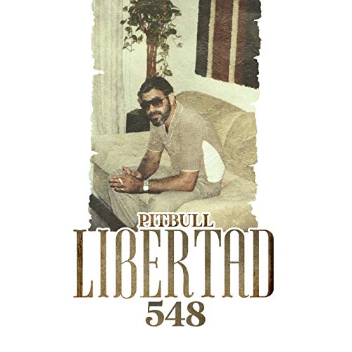 "CD cover with a man sitting on a couch, wearing sunglasses and a watch."