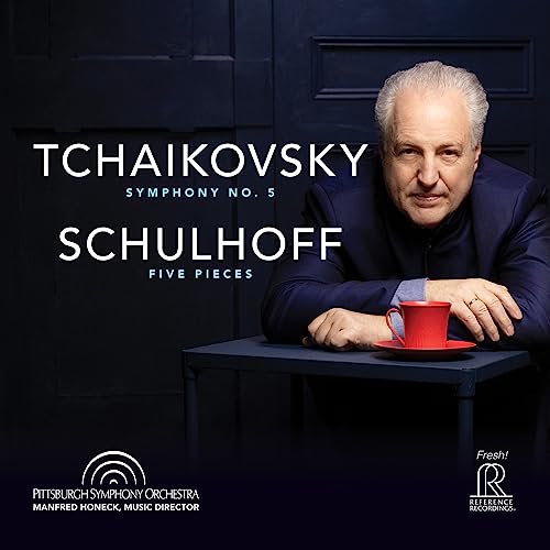 CD cover featuring conductor Manfred Honeck with a red teacup.