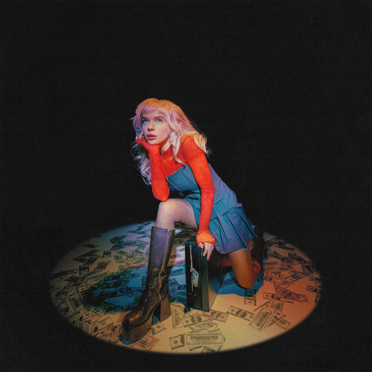 Pixey album cover: woman in red and blue on money-covered floor.