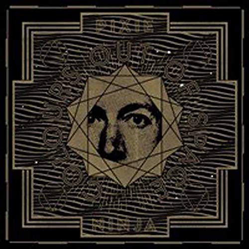 Vinyl album cover with a face inside a geometric star shape.