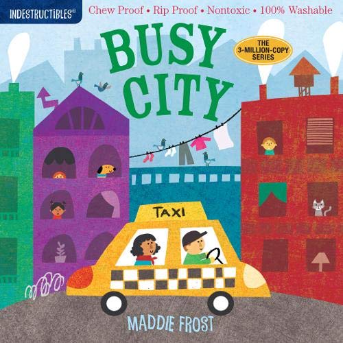 A yellow taxi drives through a colorful city street with buildings and people.