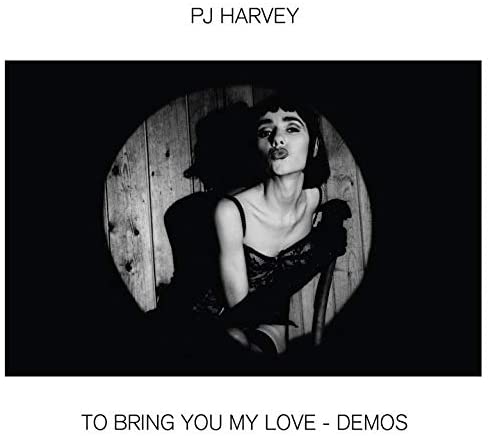 Black and white album cover featuring a woman in a dark dress.