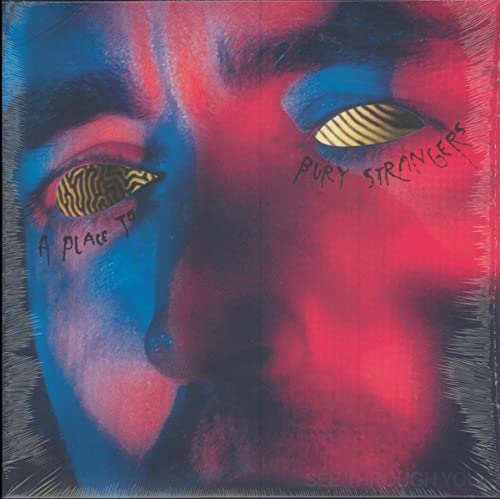 Record album cover with a distorted face in red and blue tones.