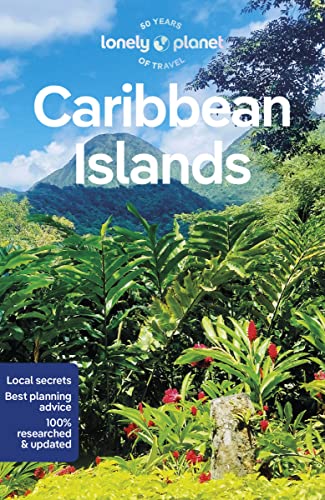 Lonely Planet Caribbean Islands travel guide cover featuring lush tropical plants and distant mountains.