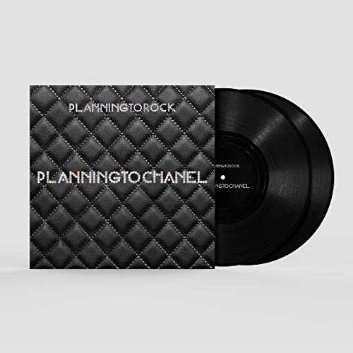 Black vinyl record with a quilted, textured album cover.