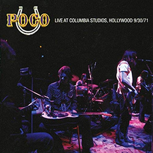 Poco album cover: band performing live with vintage stage lighting.