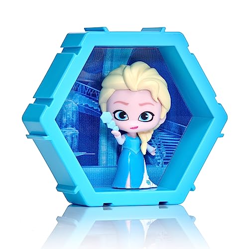 Elsa figurine in a blue hexagonal plastic display case.