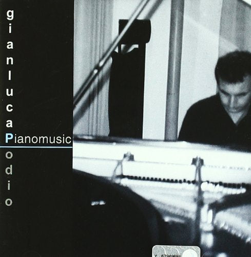 Black and white CD cover featuring a pianist at a grand piano.
