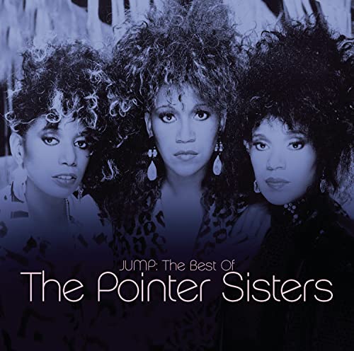 Portrait of the three Pointer Sisters with large hair against a blue-toned background.