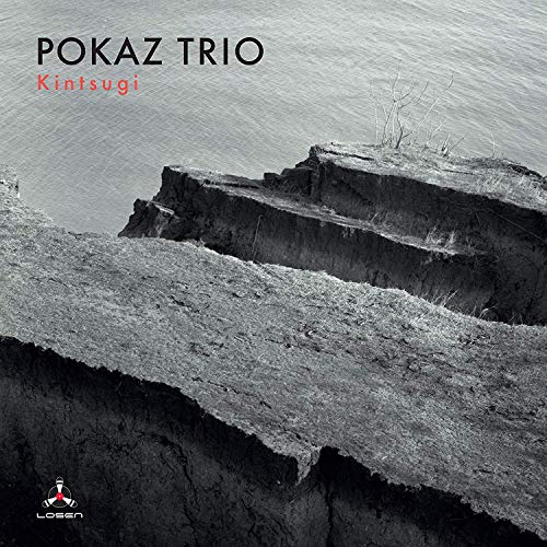 Album cover with a grayscale rocky cliffside and "POKAZ TRIO Kintsugi" text.