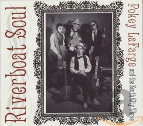 Black and white photo of a four-piece band in a decorative frame.