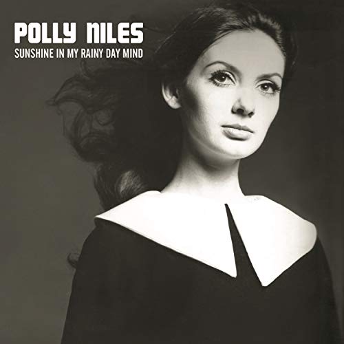 Black and white album cover featuring a woman with dark hair and a dark dress.