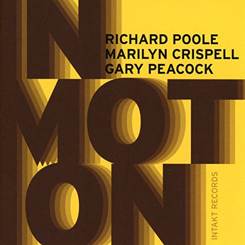 "Album cover with 'In Motion' in large brown letters on a yellow background."