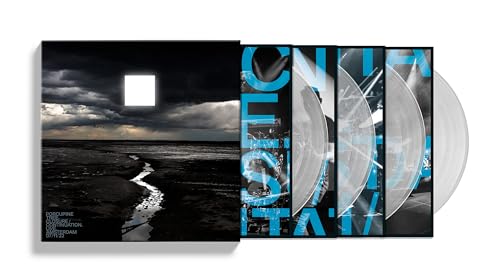Porcupine Tree live album vinyl box set with dark landscape cover and clear records.