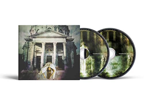 Porcupine Tree Coma Divine album cover and two CDs featuring a neoclassical building.