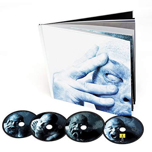 Porcupine Tree "In Absentia" CD: album cover with face and four discs.
