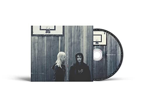 CD case with two hooded figures in front of a wooden wall.