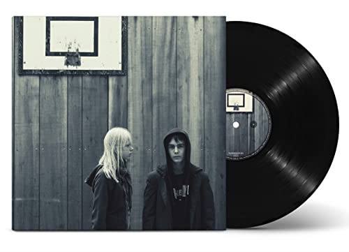 Porcupine Tree vinyl record with cover art of two figures and a hoop.