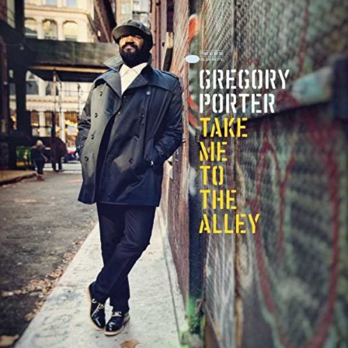 "Album cover with Gregory Porter standing in an alleyway, text reads 'Take Me To The Alley'."
