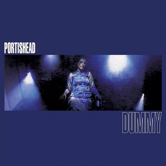 The image depicts a vinyl record cover with a woman in a blue dress.