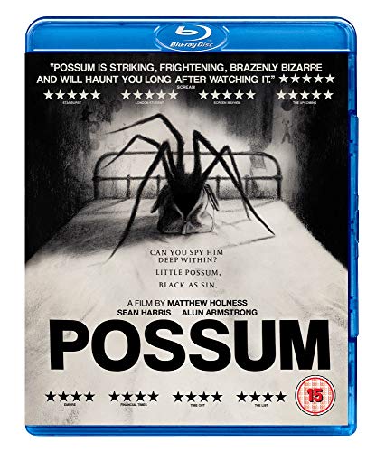 Blue-ray case with a black-and-white cover featuring a large spider on a bed.