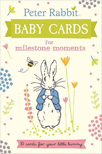 "Book cover featuring Peter Rabbit in a blue jacket surrounded by flowers and a bee."