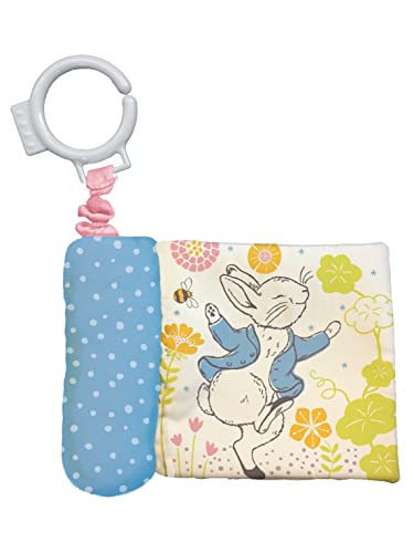 Soft baby book featuring Peter Rabbit with a bee and floral design.
