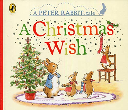 "Children's book cover featuring Peter Rabbit and friends decorating a Christmas tree."