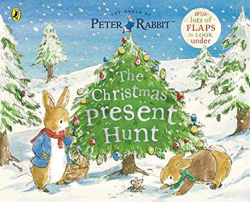 Peter Rabbit Christmas book cover with a decorated tree and rabbits.