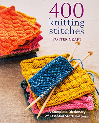 Book with knitting stitches, dense pages, likely photographs and diagrams of stitch patterns.