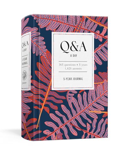 Navy journal with coral fern pattern and white label reading "Q&A a Day".