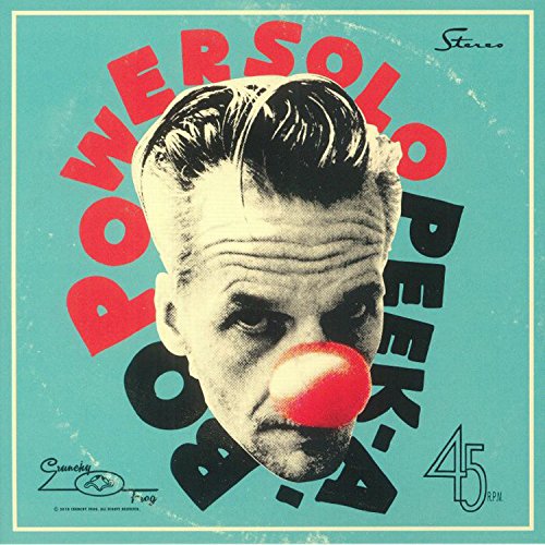 Vintage vinyl record cover featuring a clown’s face with red lettering.
