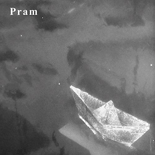 Black and white album cover featuring a paper boat floating on dark water.