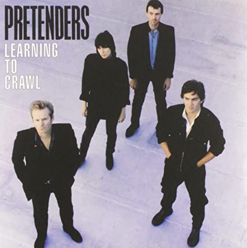 The Pretenders' "Learning to Crawl" album cover featuring four band members.