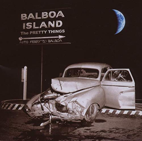 Wrecked car under a sign reading "Balboa Island" with a crescent moon.