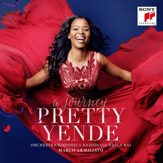 "Album cover featuring a smiling woman in a red dress against a blue background."