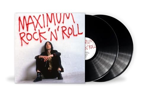 Vinyl record set with album cover featuring a seated musician.