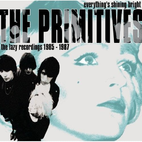 "Album cover with band members and a face, titled 'The Primitives'."