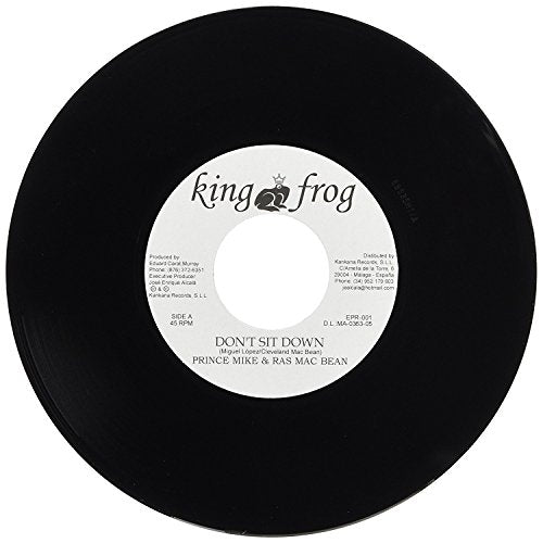 Black vinyl record with a white label featuring text and a crown logo.
