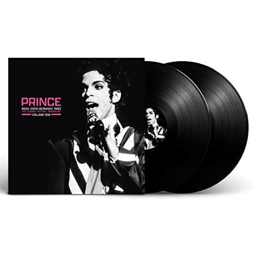 Prince album cover and two black vinyl records on white background.