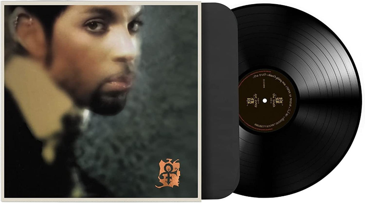 Vinyl record with a black disc and a cover featuring a man's profile.