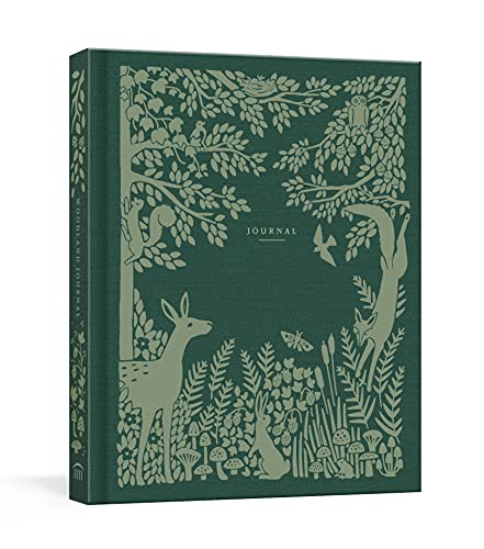 Dark green journal with embossed forest animals and foliage design.