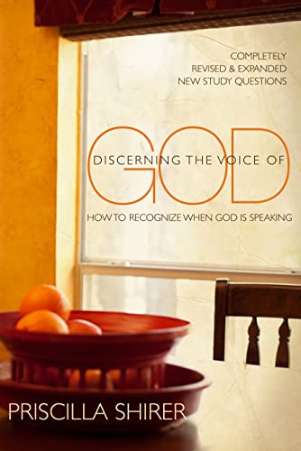 Book cover with orange fruit in foreground, title “Discerning the Voice of God.”