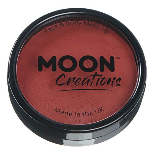 A circular black container filled with dark red face and body paint.
