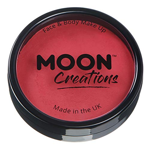 A round black container of magenta face and body paint by Moon Creations.