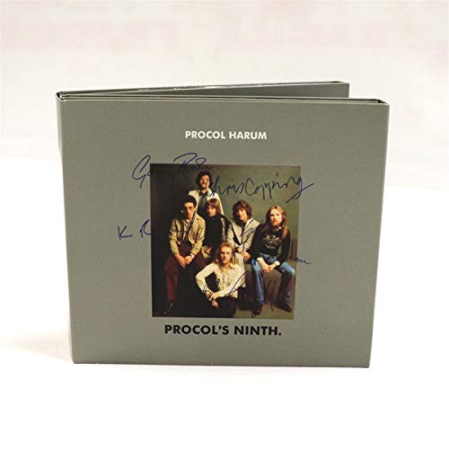 A gray CD case featuring a band photo of Procol Harum with handwritten signatures.