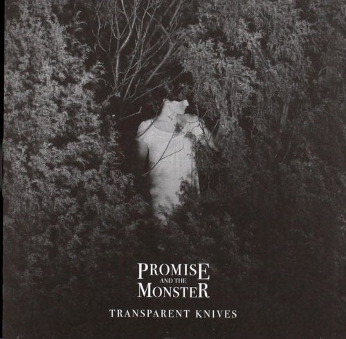 Black and white album cover with a figure obscured by foliage.